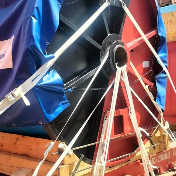 Close-up of a large Radaelli industrial reel unitized and secured on a shipping platform.