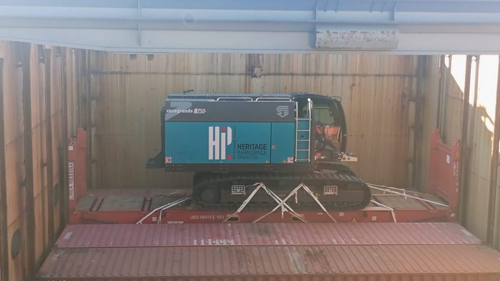 A Casagrande B250 driller cabin secured on a platform inside the ship's hold.