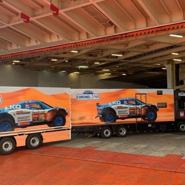 A Coronel Dakar Team truck and trailer entering the ramp of a Messina RO-RO vessel.